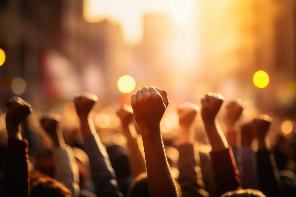 Message solidaire aux membres de la Région Ouest du SEVL-SCFP-2815 Vecteezy A Group Of People Raising Their Fist As A Symbol Of Protest 43531336 1024x683